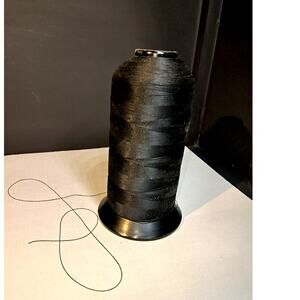 1447.  Large Spool of Black Thread.